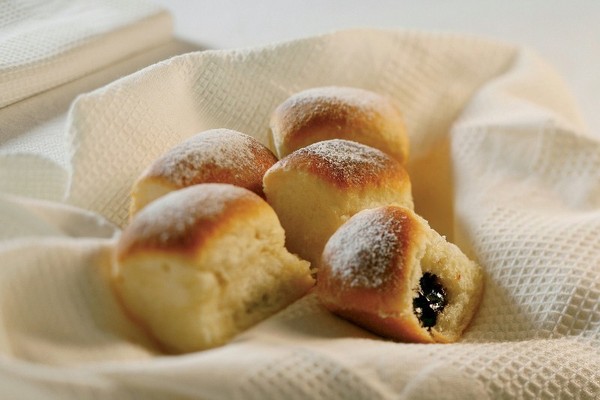 “Buchteln“, or yeast buns, with plum-jam and quark
